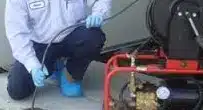 Plumber Rodding a Sewer